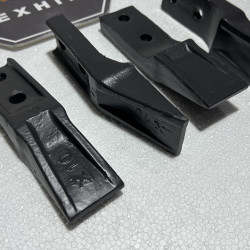 Зуб до ковша